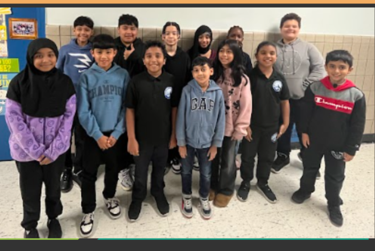 Students from the Debate Team posing for group picture.