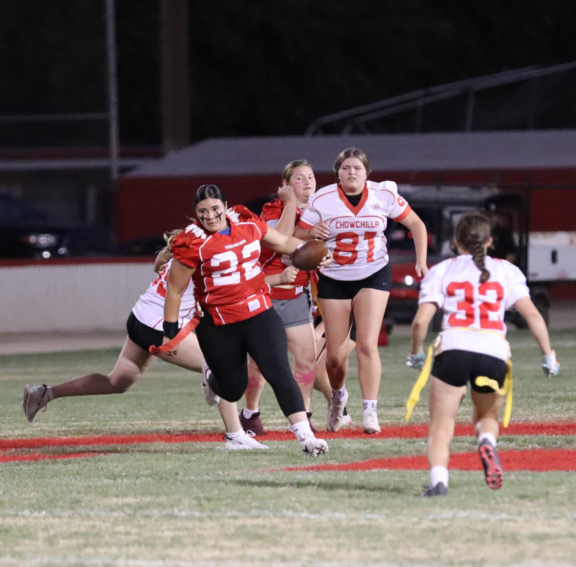 girls playing flag football