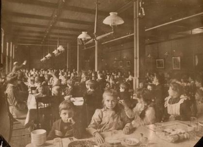 Student dine in formal dining hall