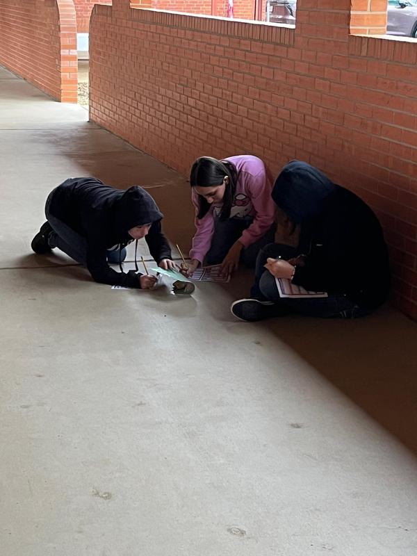 Students working on an Easter assignment for English II.