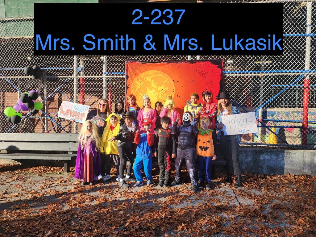 staff and students in halloween costumes