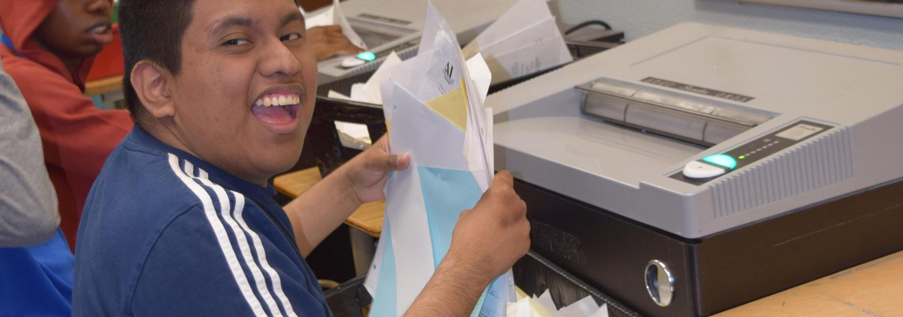 Student shredding papers