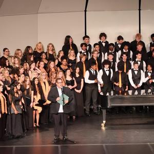 A group of students performing at the choral concert.