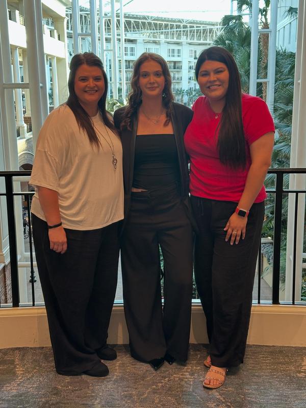 MHS national competitor Lily Adams with her two sponsors