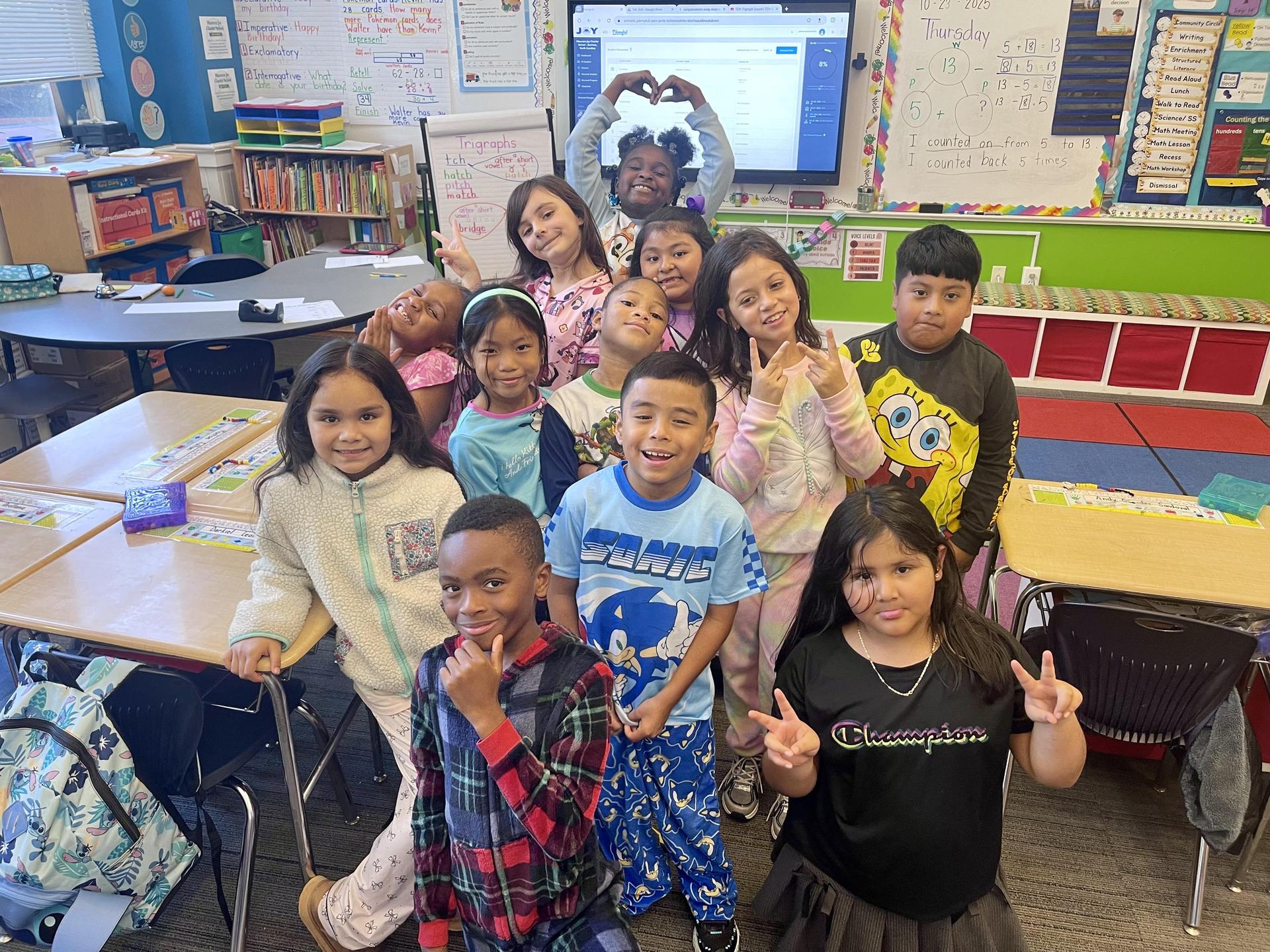 Students having a pijama paty in classroom