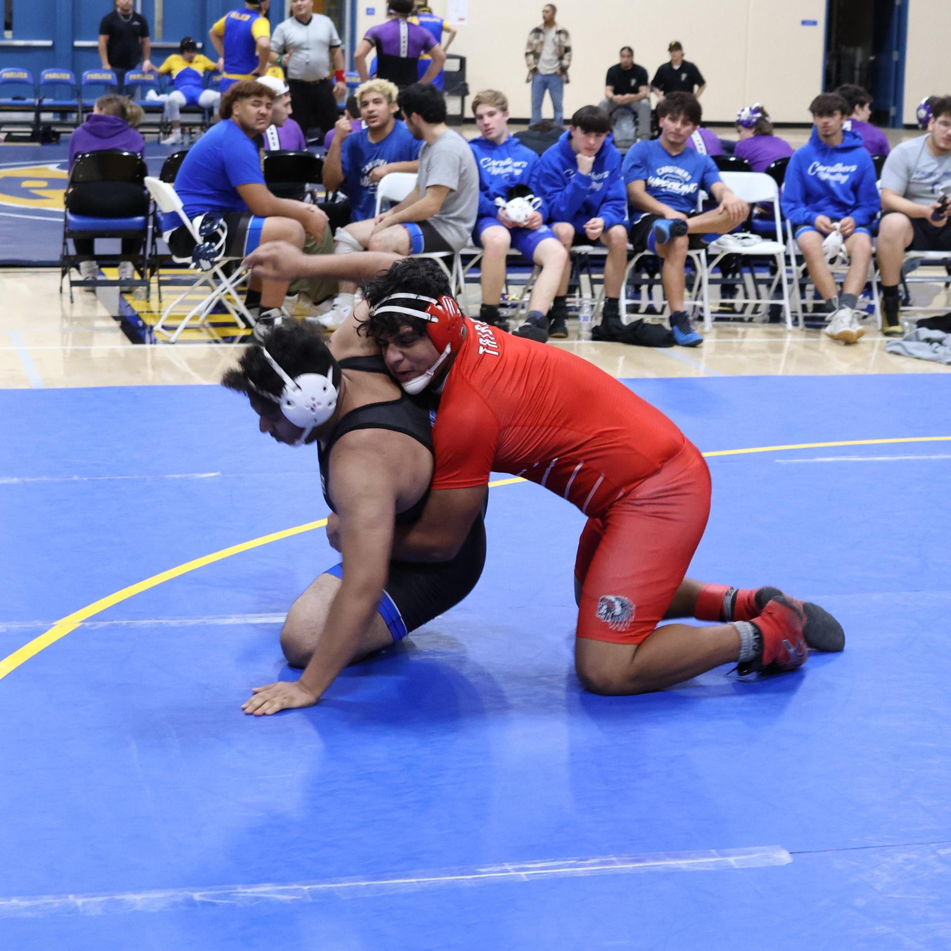 wrestlers in action at parlier