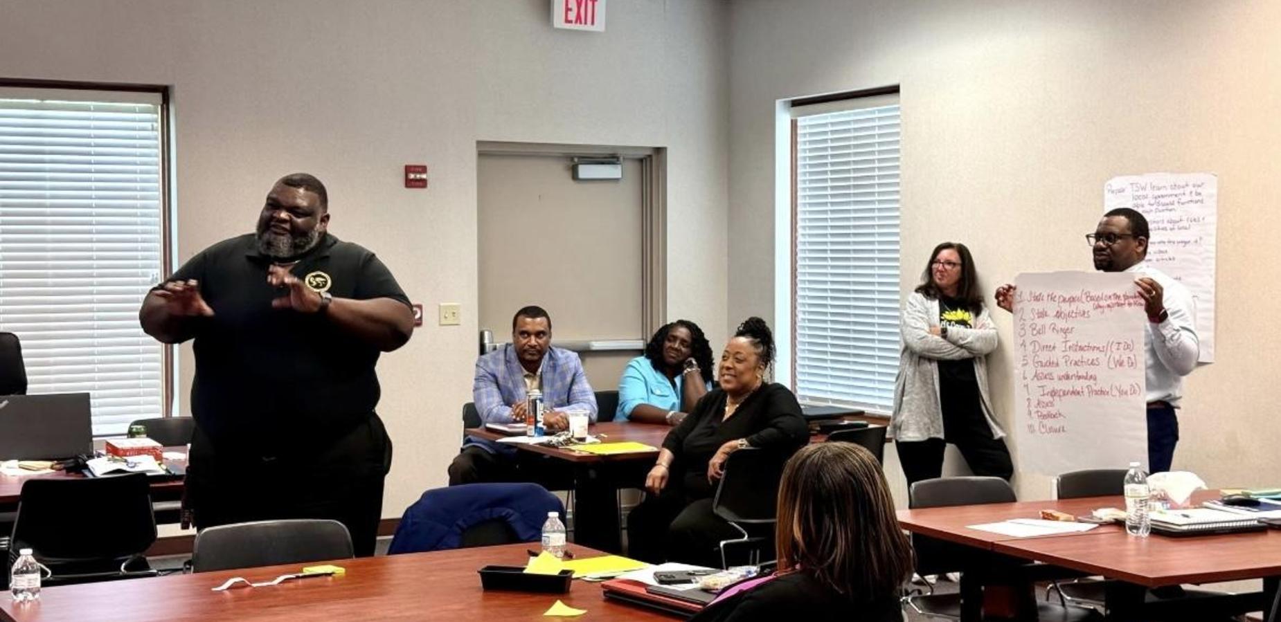 Principal Brunson engaged in Leadership Meeting