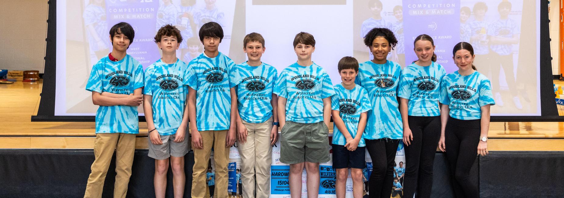Champion VEX Robotics teams pose