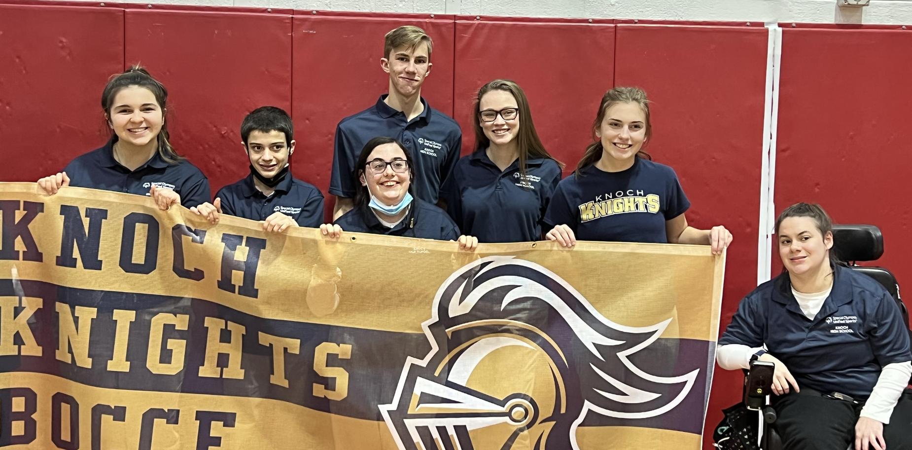 Knoch Bocce team with their banner