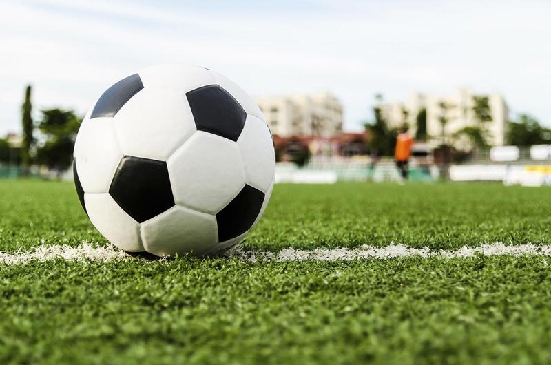 Soccer ball in field of grass