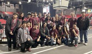 Team Group photo with scoreboard