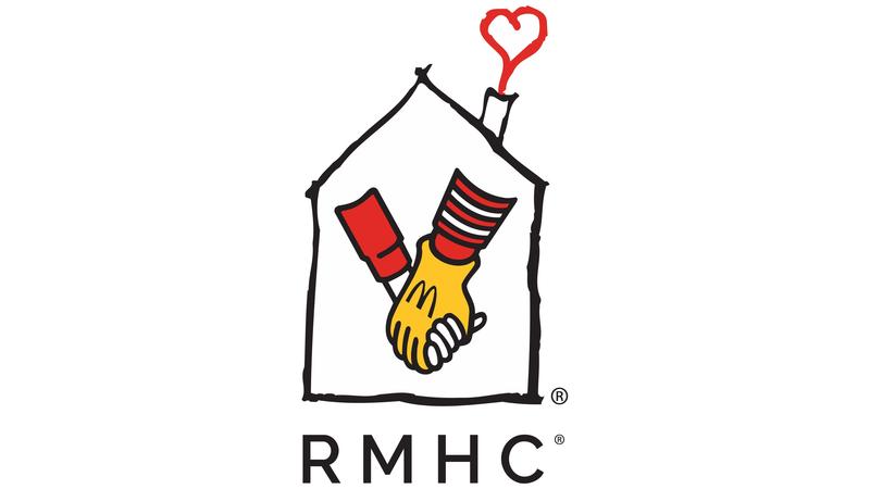 Two hands holding inside a house outline with a heart above.