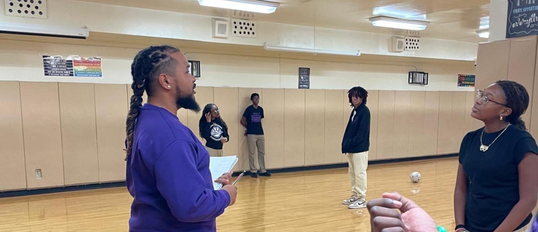 Mr. Dicen teaching his Physical Education class