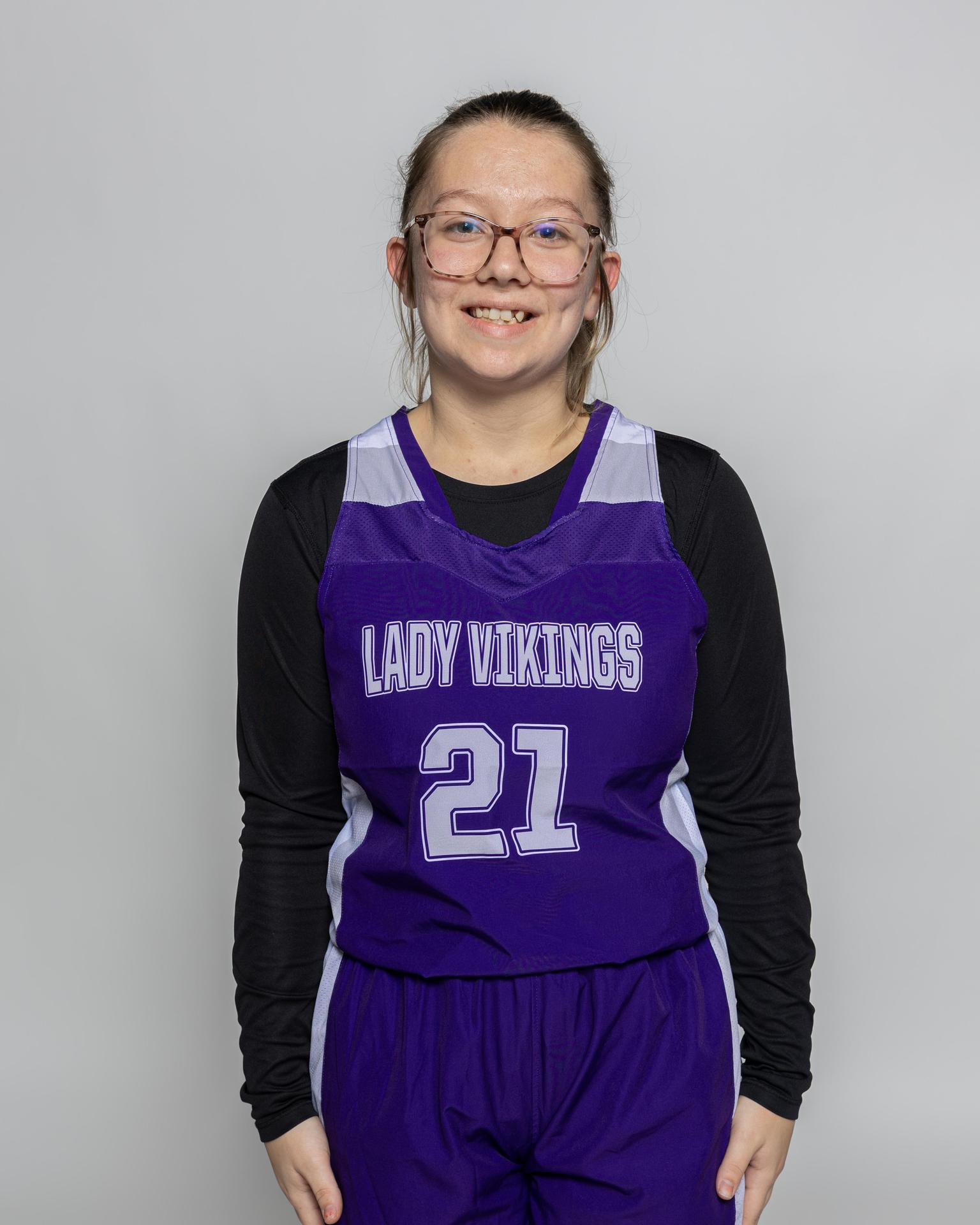 Female player number 21 posting for the roster