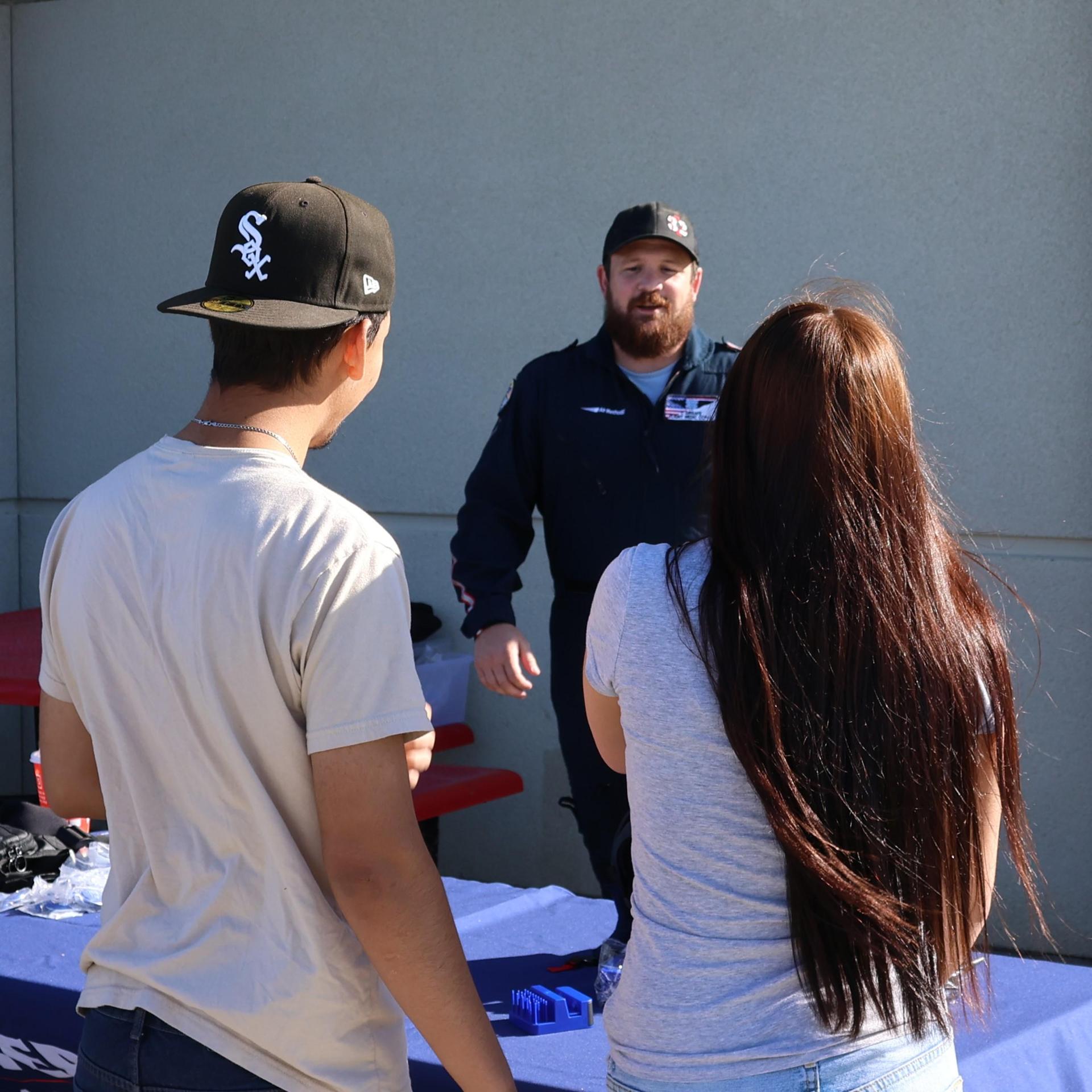 Paramedic talking to students