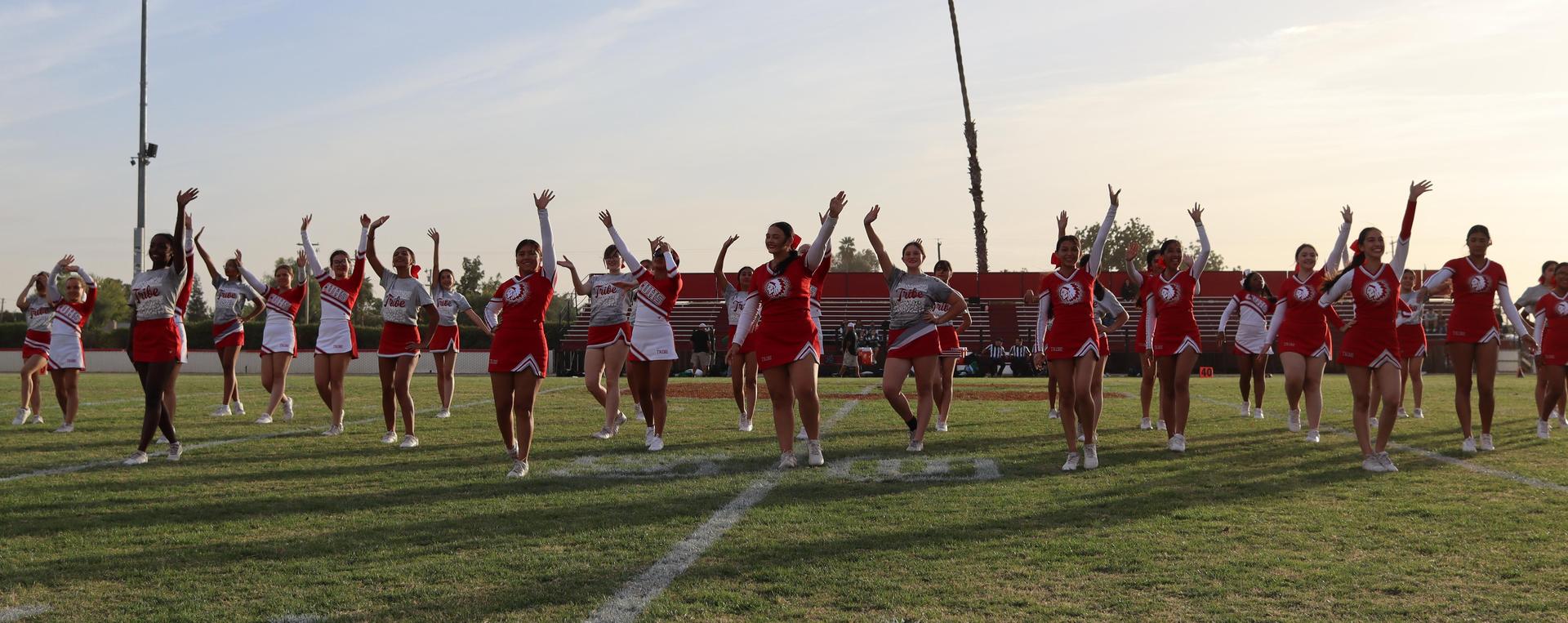 Cheerleaders performing at the football game