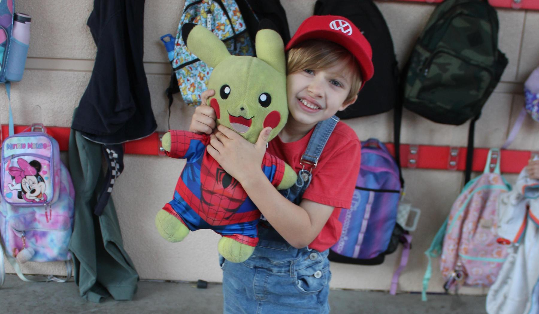 student and stuffed animal