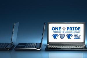 open laptops displaying school log on screen