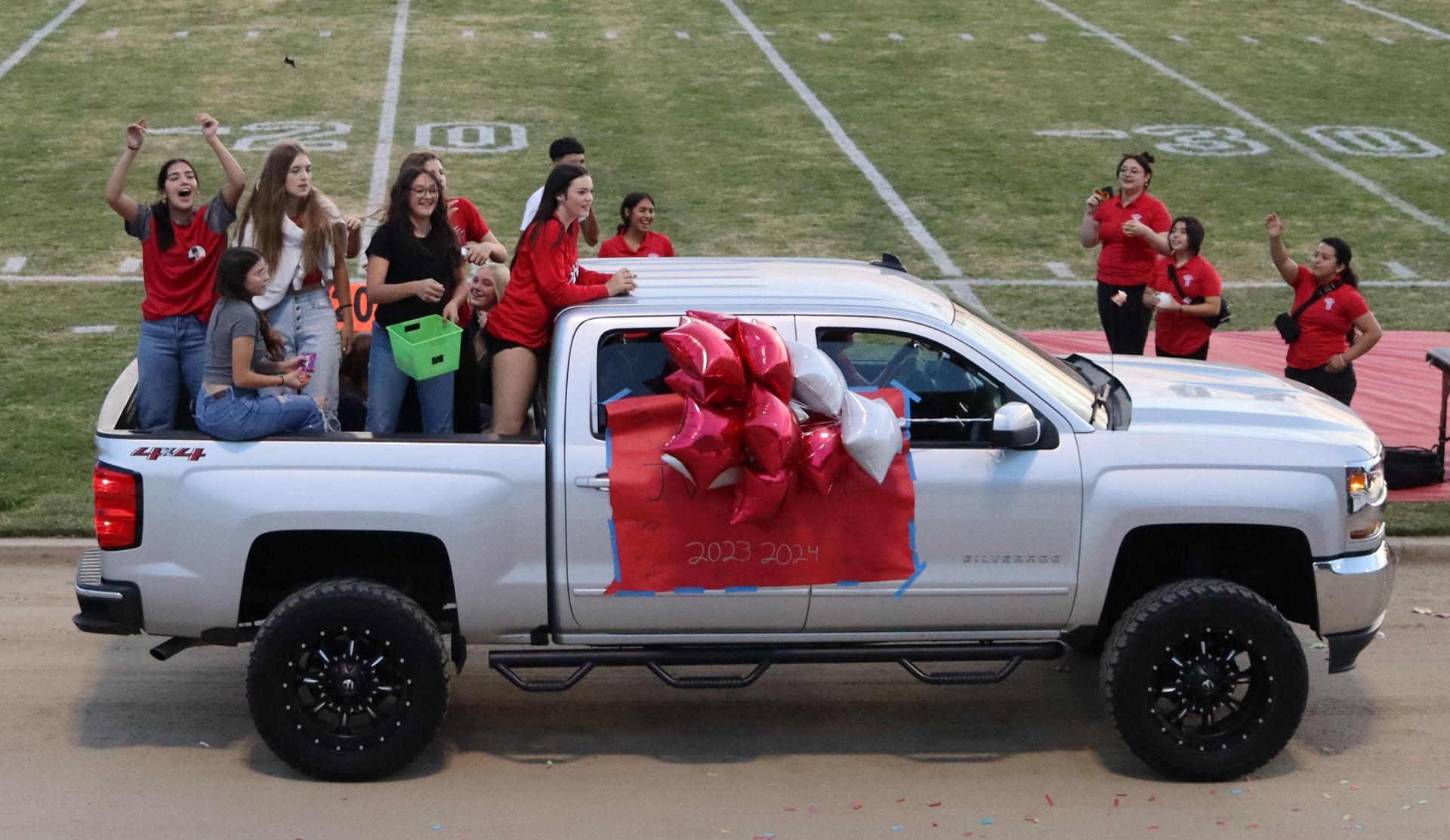 floats on the track between football games