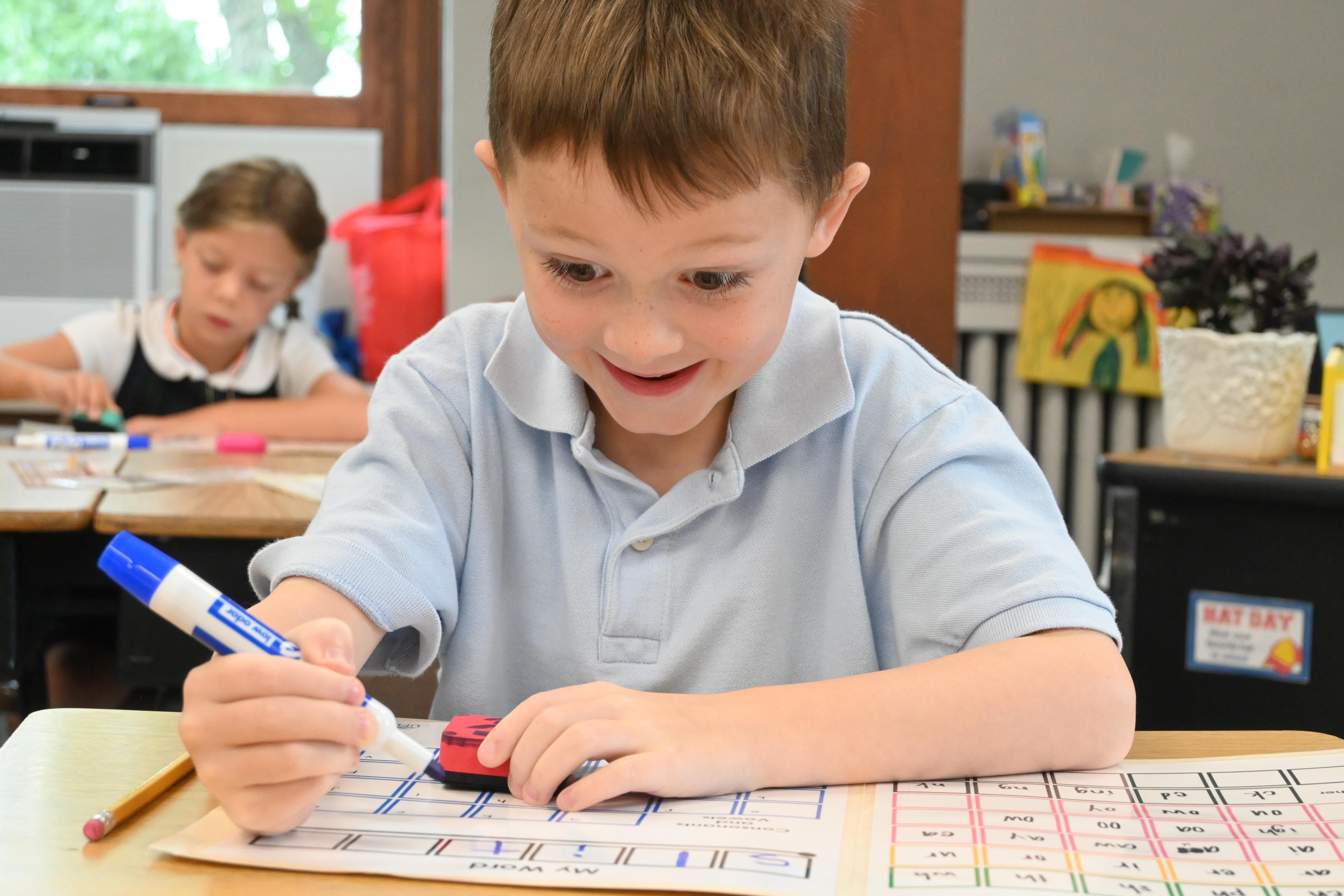 Elementary student practicing writing