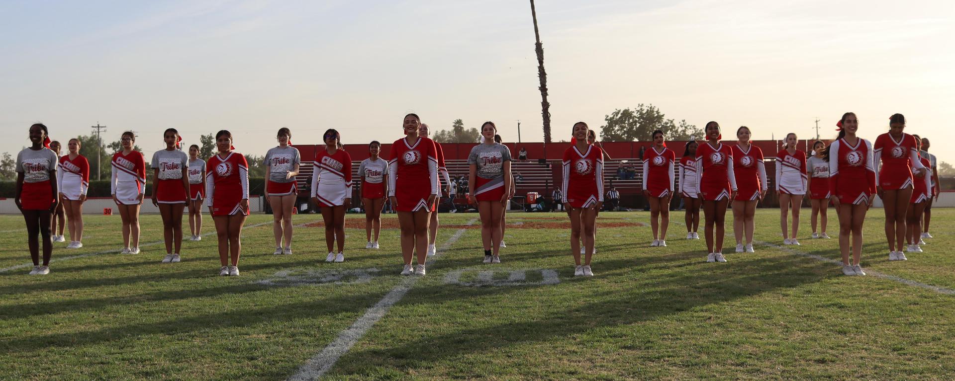 Cheerleaders performing at the football game