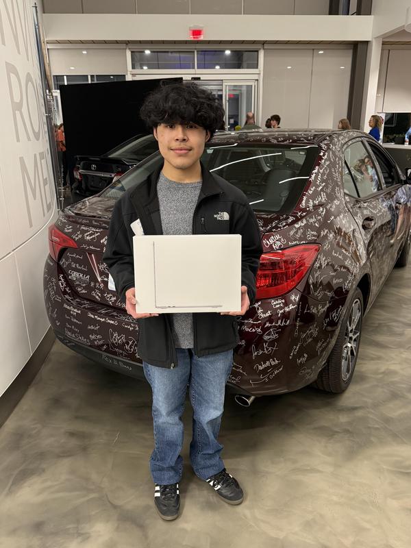 Chris Tzib with his MacBook Air