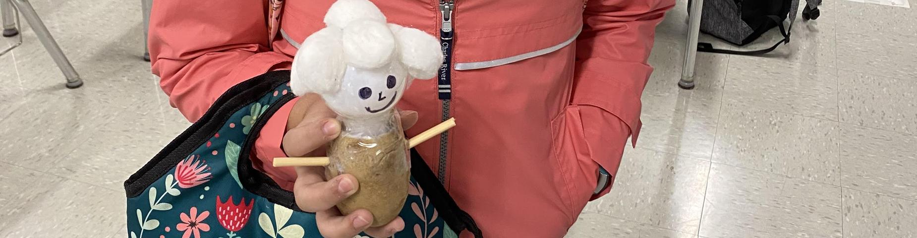 A potato dressed like Thomas Edison made by a student.