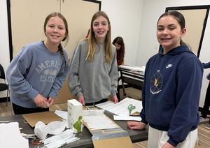 Three students posing for a photo