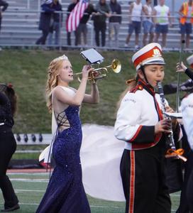 TK Homecoming queen Avery Hagemann does double duty also playing in the band at homecoming.