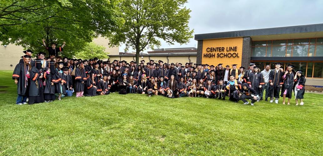 Graduating Class of 2025 in front of Center Line High School.