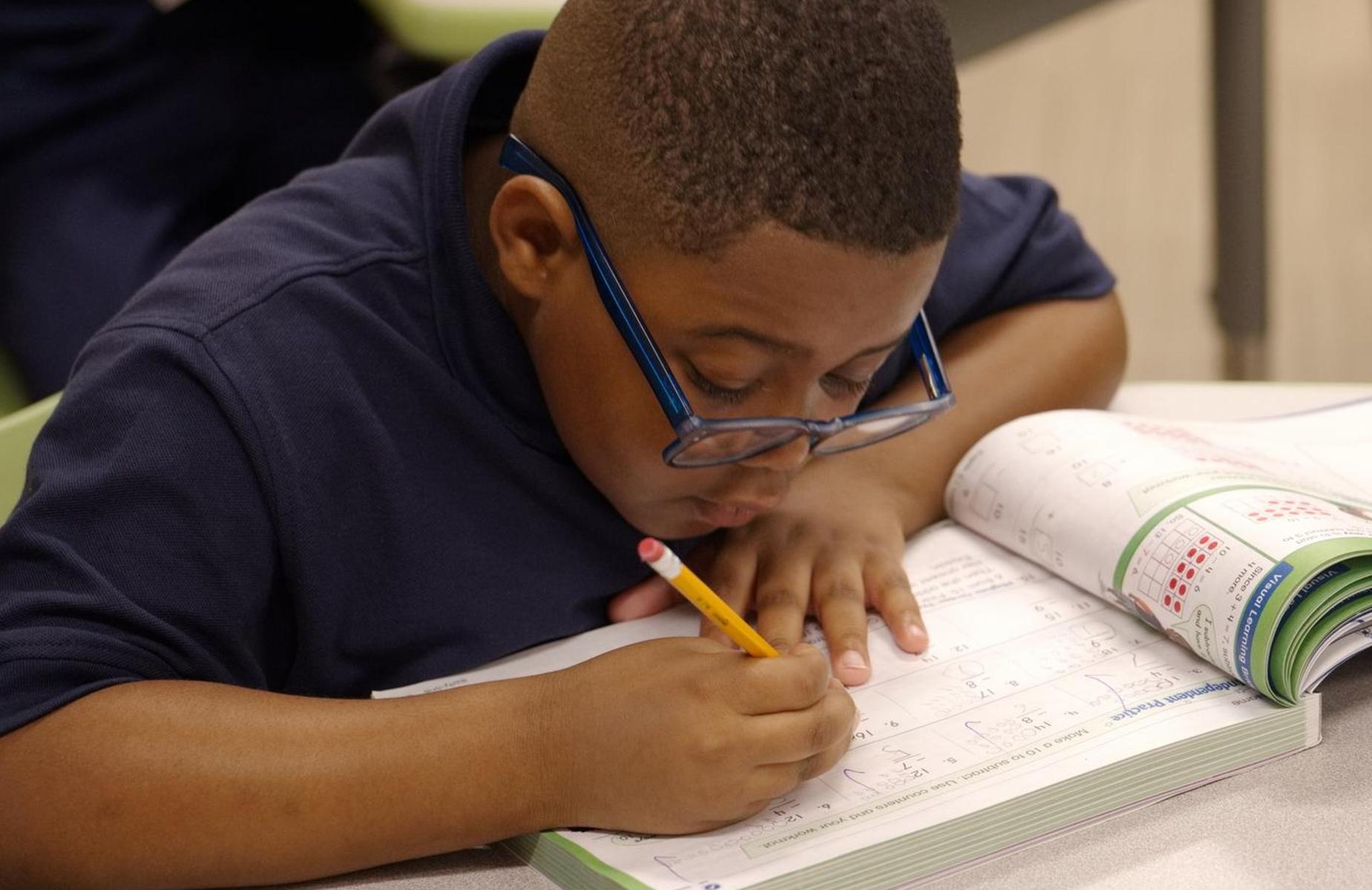 Student in workbook