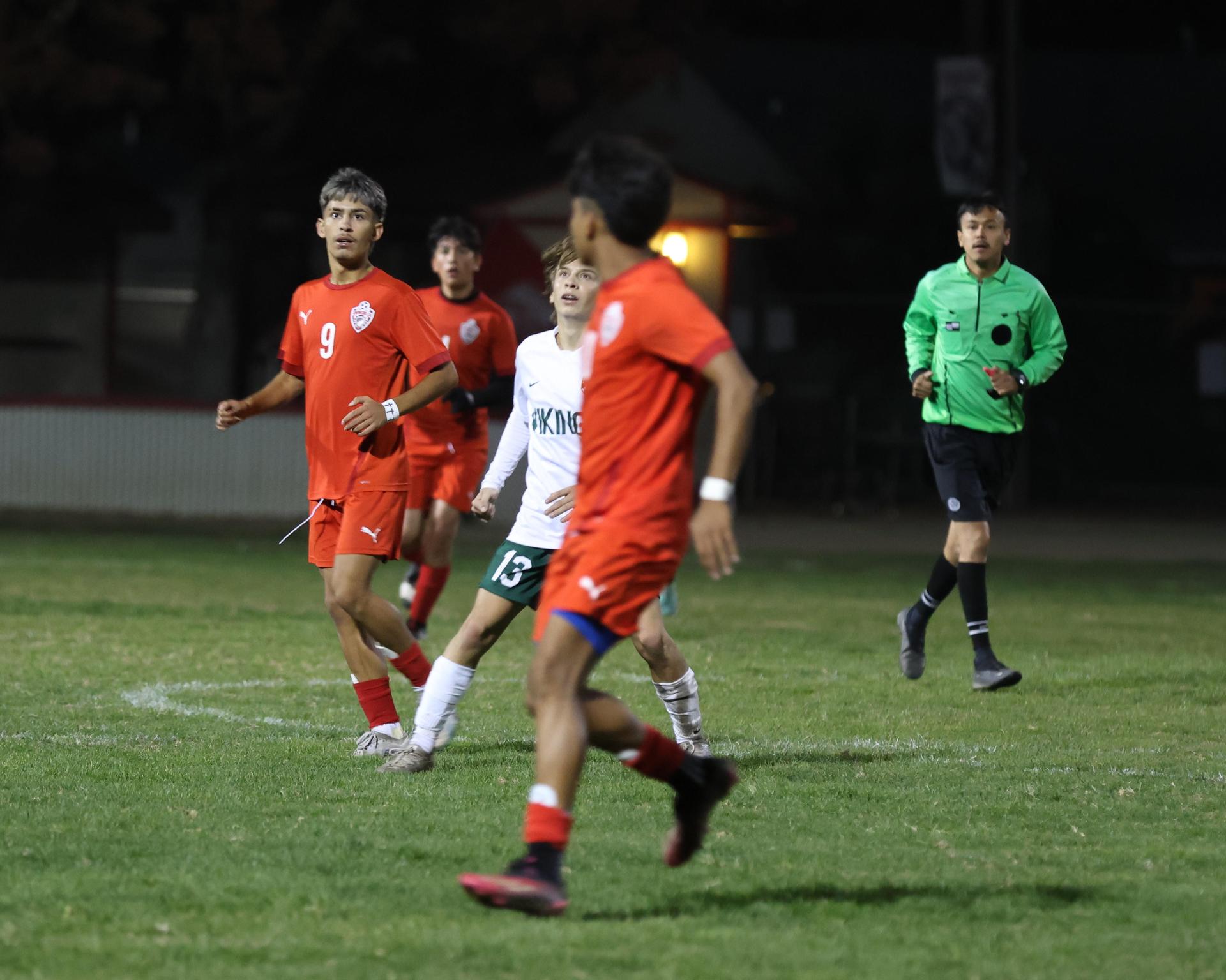 Varsity boys play soccer against Kingsburg