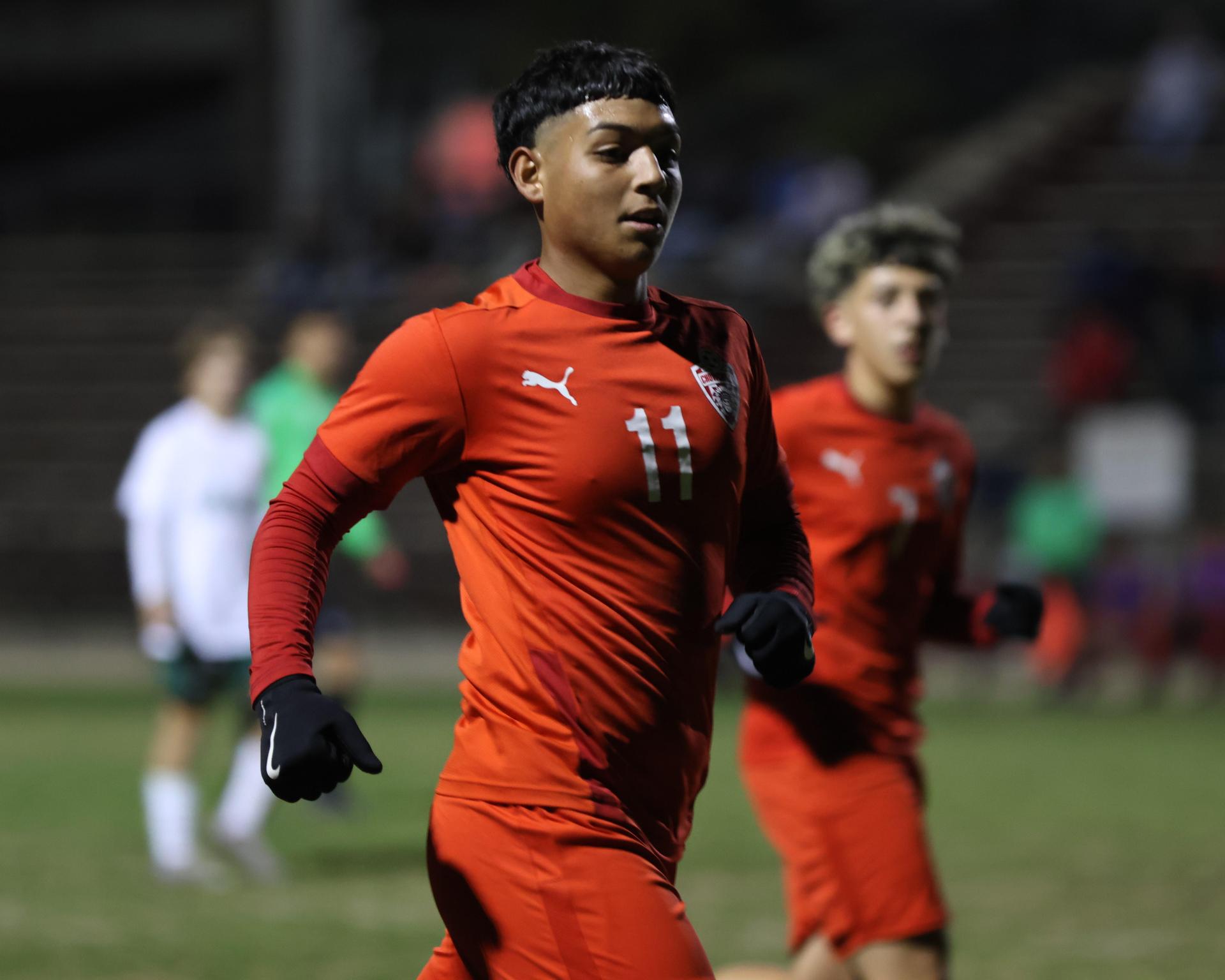 Varsity boys play soccer against Kingsburg