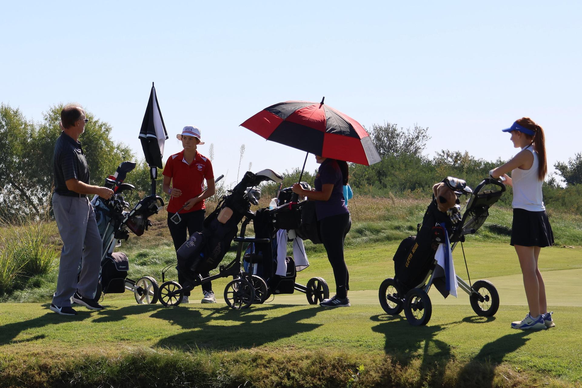 Asterisk Talley on the golf course playing for the central section championship