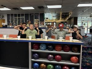 These boys are ready for some bowling.
