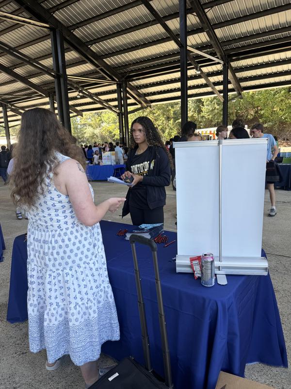 PHS students at the career fair, meeting with different people at tables