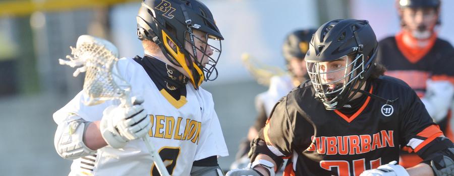 Boys lacrosse playing York Suburban