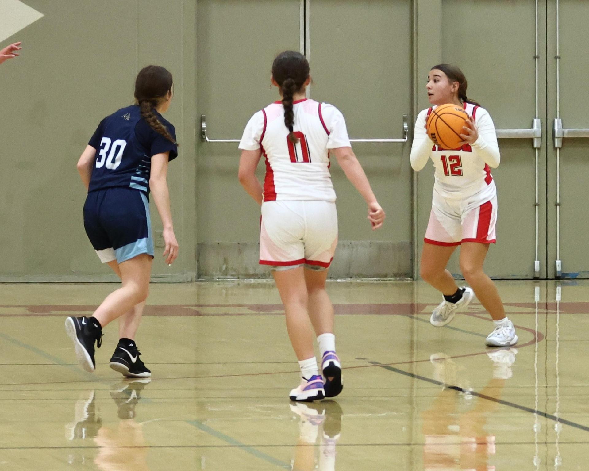 varsity girls playing against yosemite