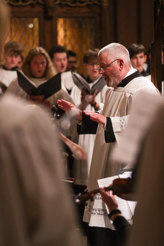 Gregory Glenn, Director of Music and Liturgy, leads the Cathedral Choir