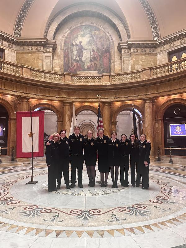 FFA members pose inside the State House Rotunda