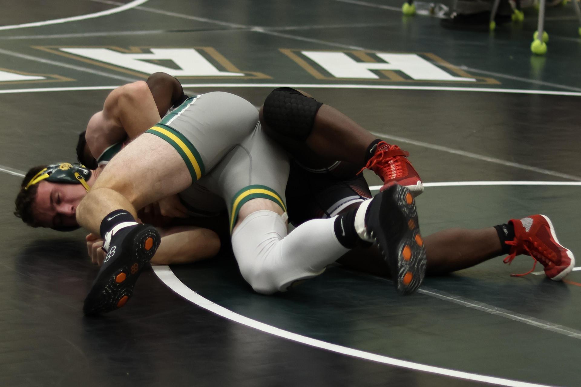 boys wrestling at liberty duals