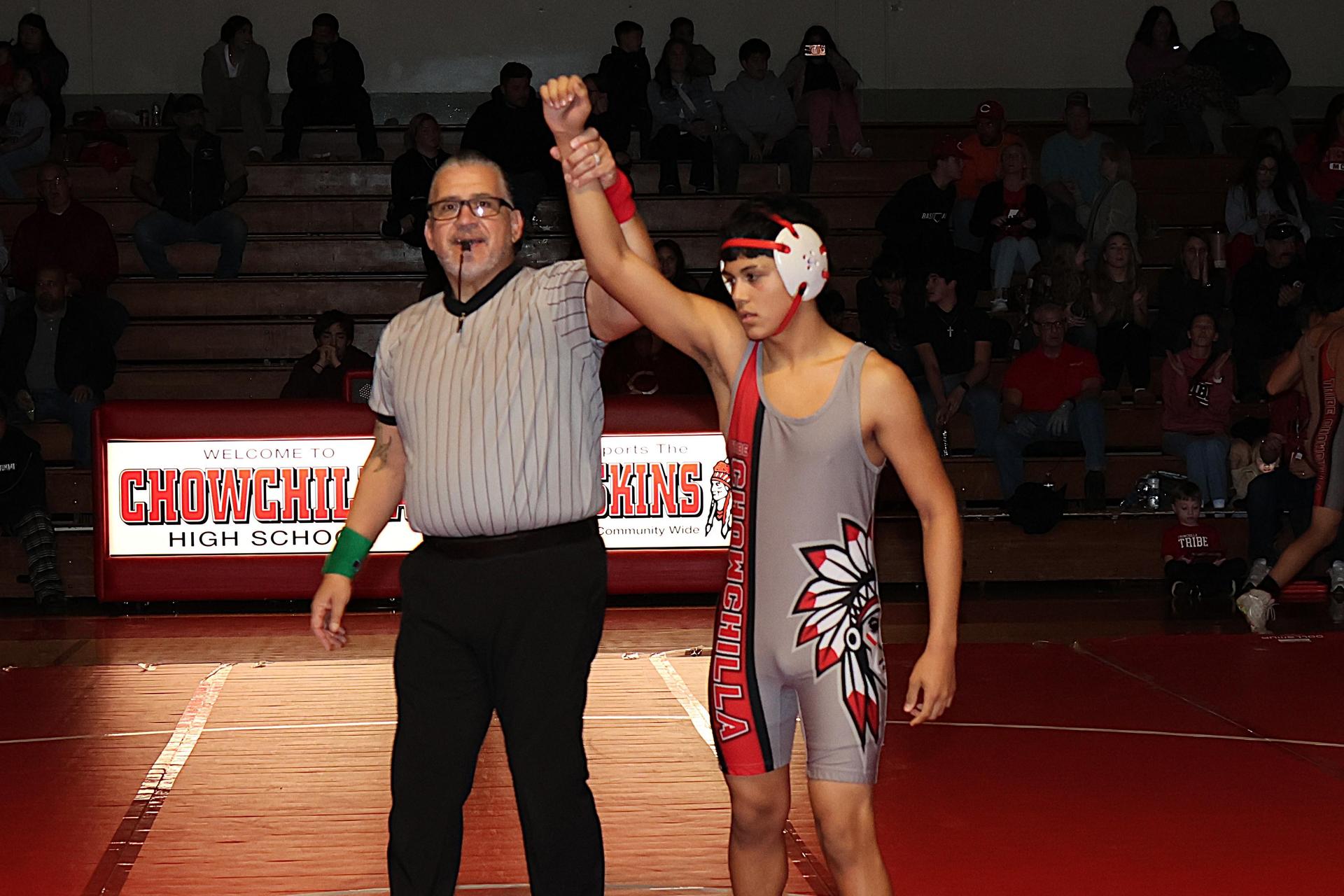 Wrestling winners with hands up 29