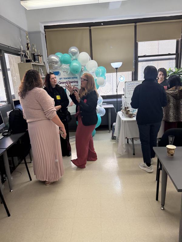 teachers talking during the open house