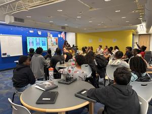 Students listen to the guest speaker