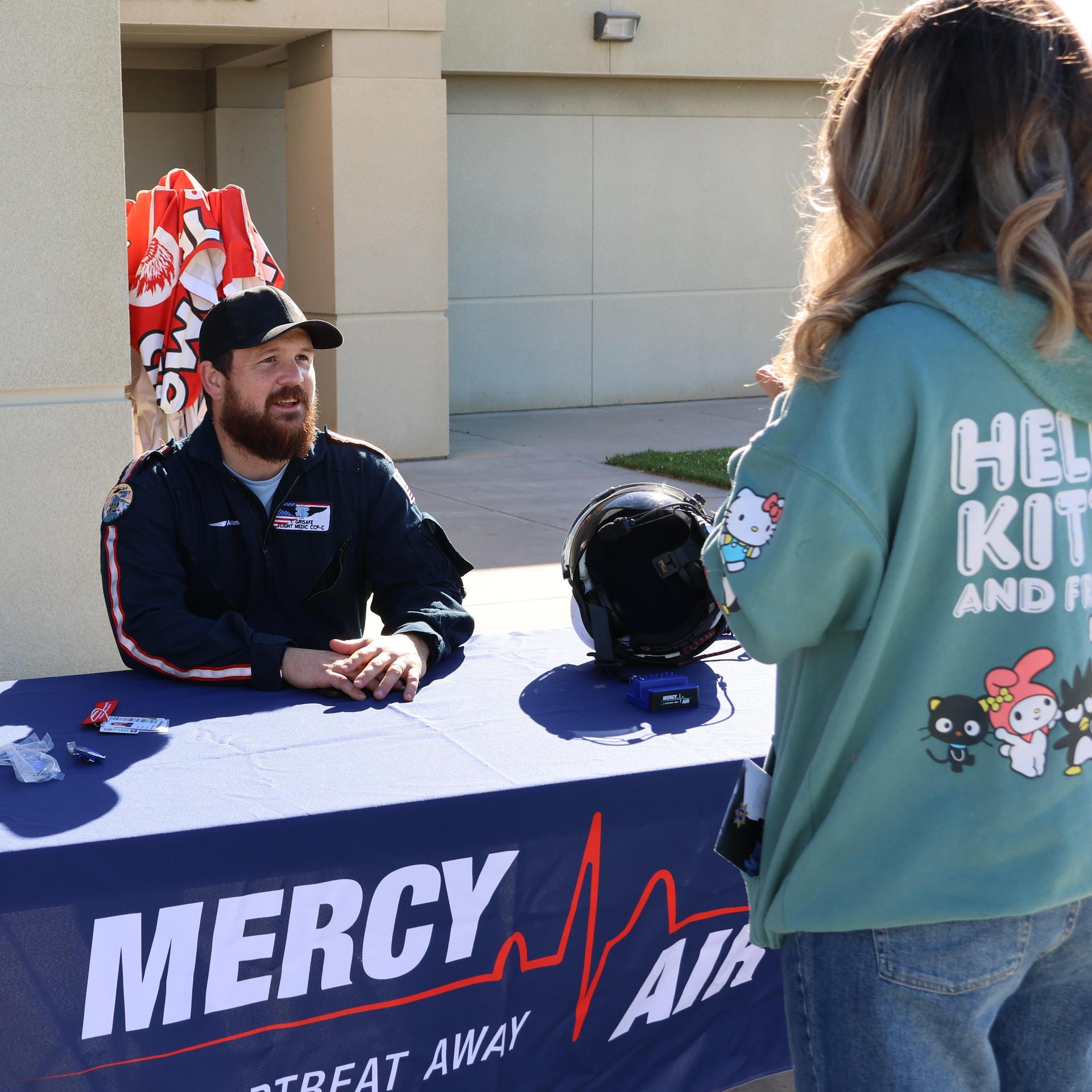 Paramedic talking to students