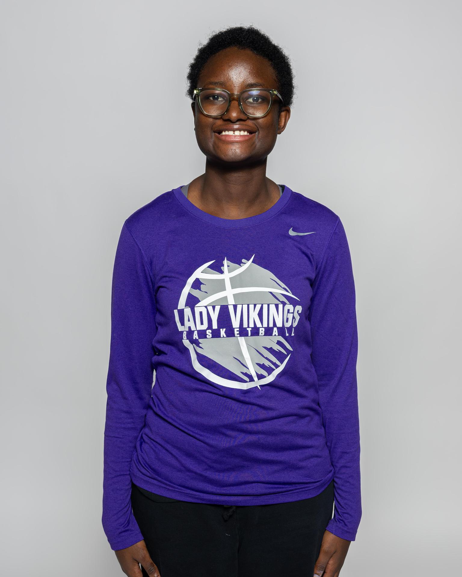 Female manager posing for the roster