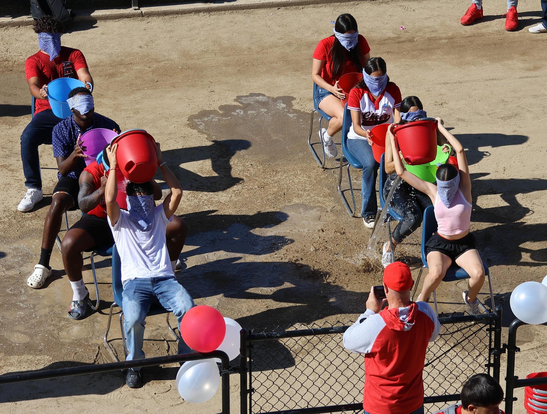 students and staff at the homecoming rally