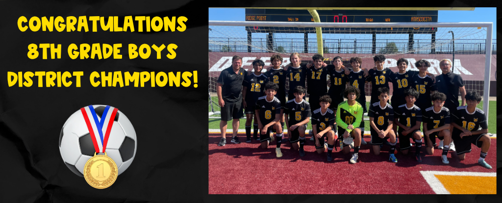 Soccer team celebrating their district championship with a trophy and medal.