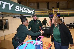 Pike County Sheriff’s Office Deputies Greet Superintendent Dr. Geneva Holmes at Eagles Carnival 2025