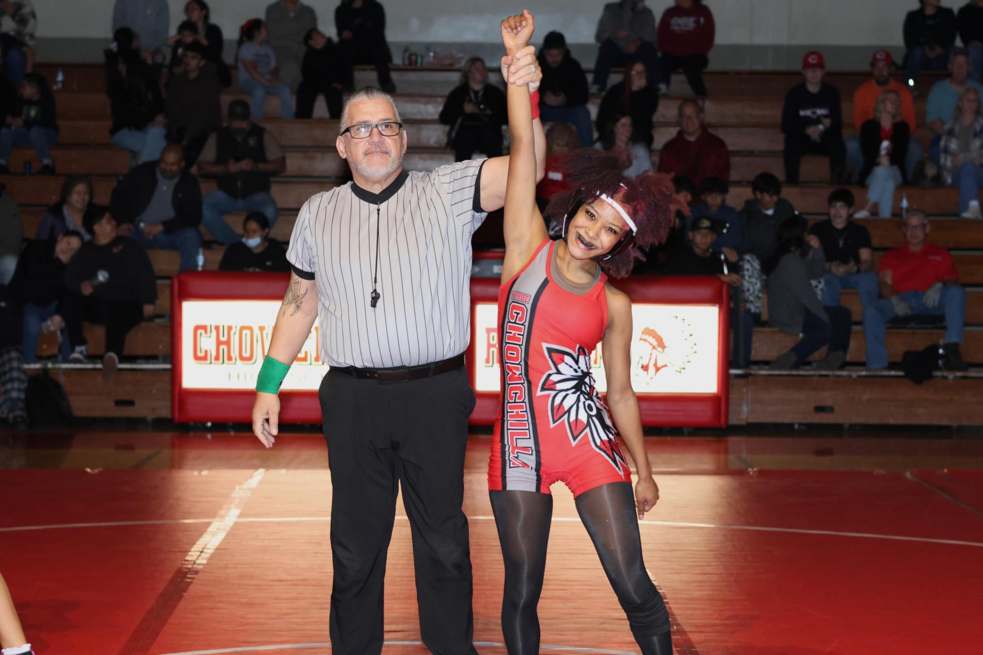 Wrestling winners with hands up 98